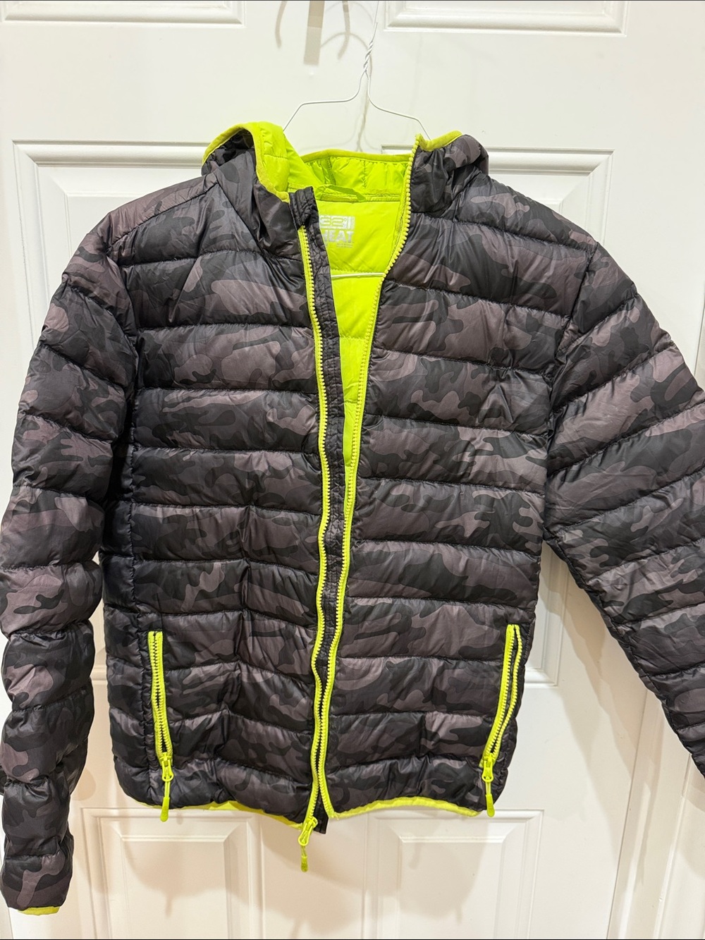 Youth Camouflage Puffer Jacket with Neon Yellow Trim.